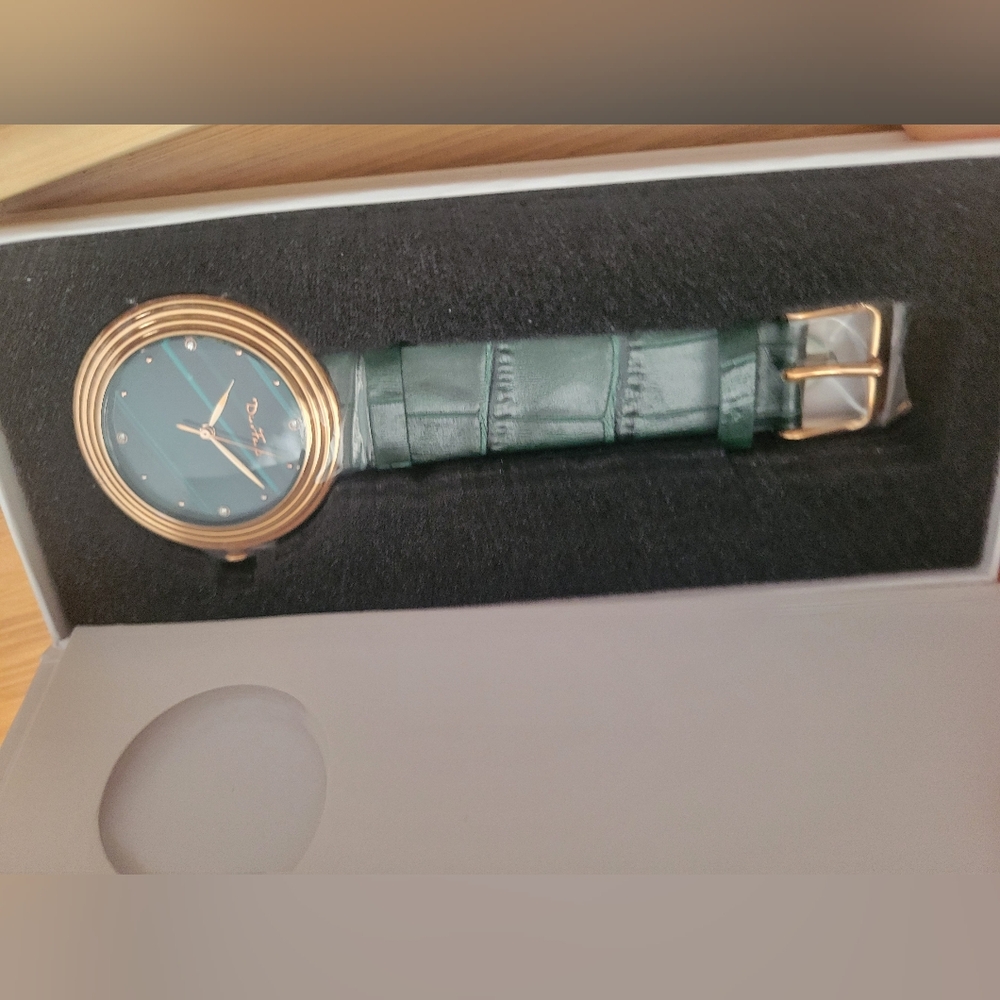 Elegant Green and Gold Watch